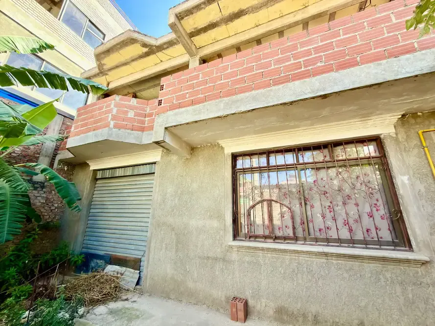 Foto 1 de Casa en Obra Gruesa con Espacio Comercial en Venta